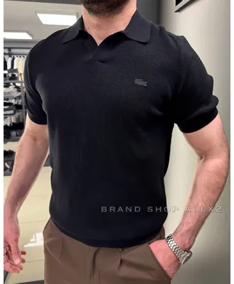Чорна поло Lacoste