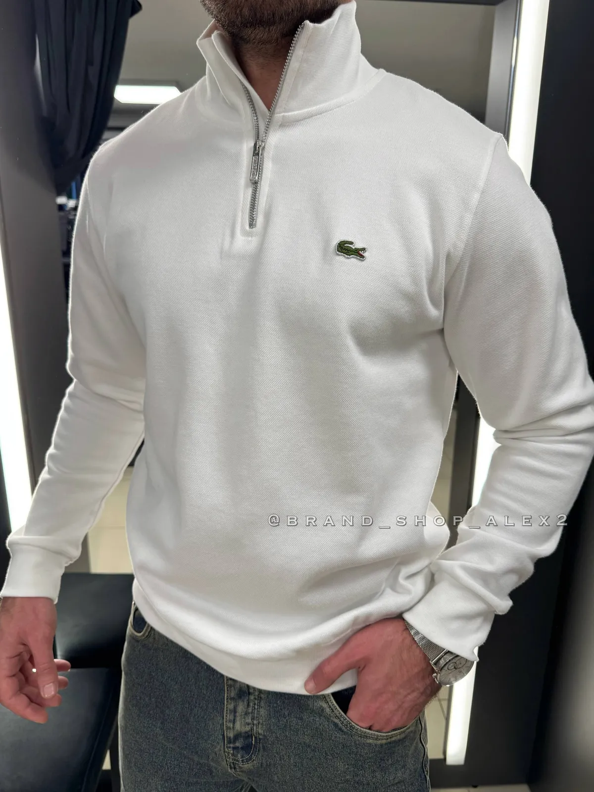 Білий джемпер Lacoste 